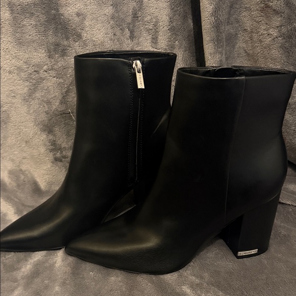 Calvin Klein Shoes - Calvin Klein Sleek Black Ankle Booties